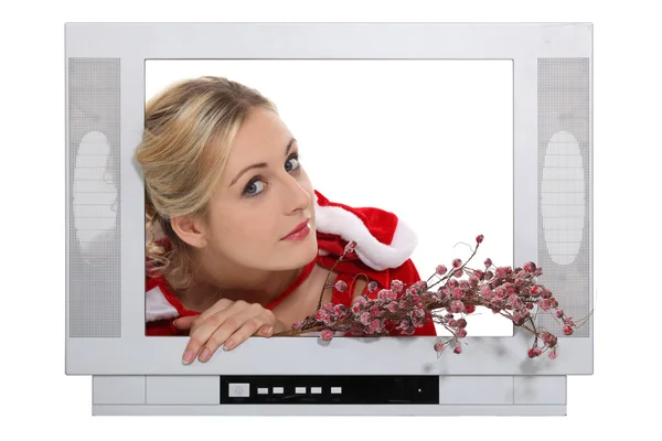 Vánoční žena uvnitř televize — Stock fotografie