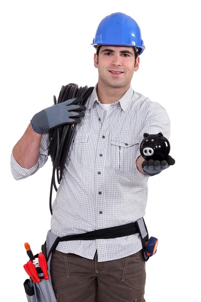Elettricista con salvadanaio — Foto Stock