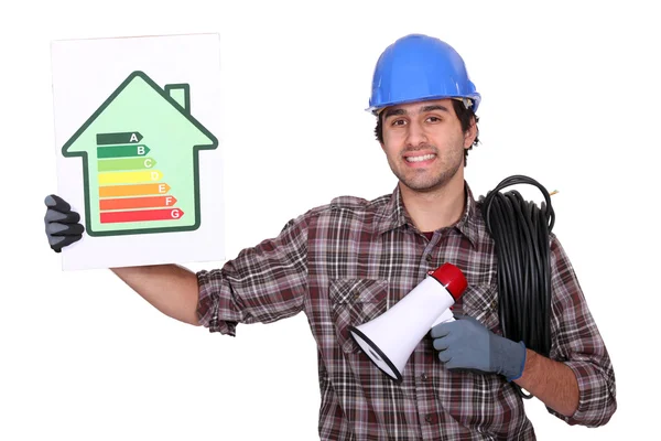 Eletricista ficou com cartaz de eficiência energética e megafone — Fotografia de Stock