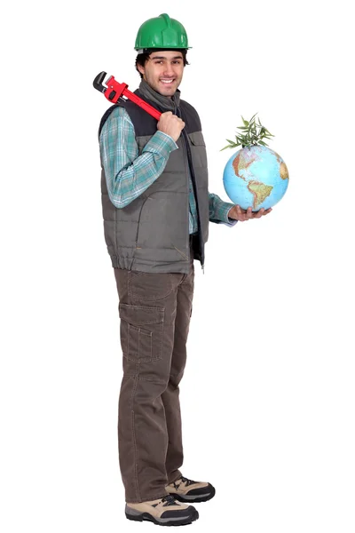 Klempner mit Globus — Stockfoto