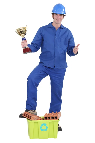 Builder awarded prize for recycling — Stock Photo, Image