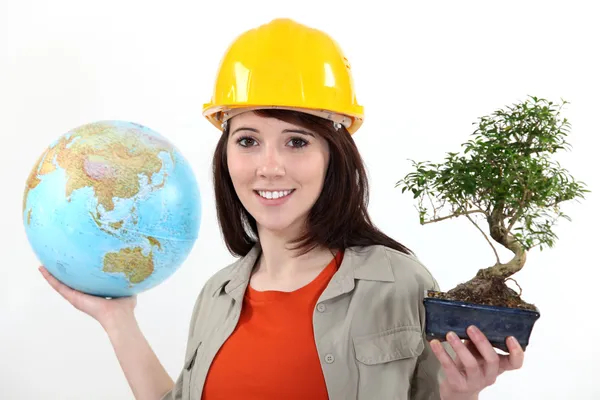Worker planting trees abroad — Stock Photo, Image