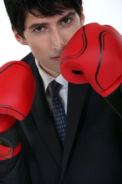 Empresario con guantes de boxeo —  Fotos de Stock