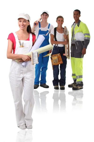 Jovens trabalhadores da construção civil isolados sobre fundo branco — Fotografia de Stock