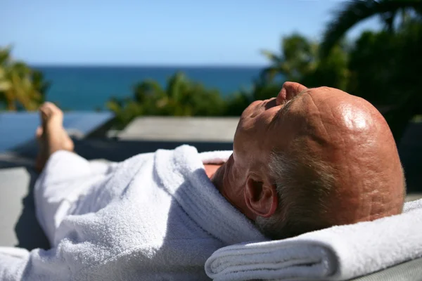 Senior man having sunbath — Stock Photo, Image