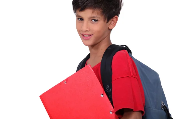 Школьник с папкой и рюкзаком — стоковое фото