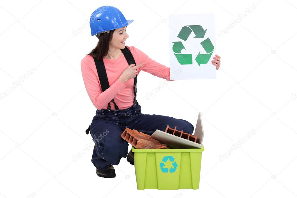 Woman recycling construction materials