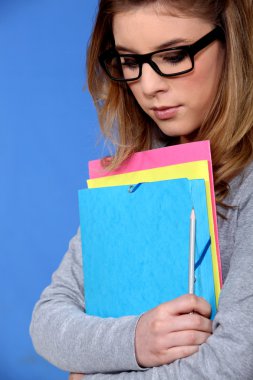 Young student carrying files clipart