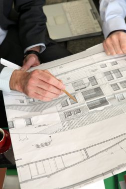 Architect debating over project details clipart