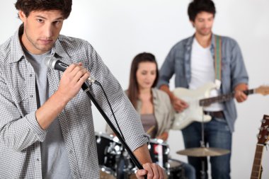 Rock band rehearsing clipart