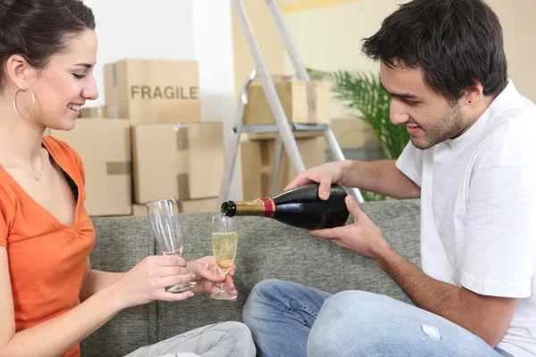 Couple toasting the new house — Stock Photo, Image