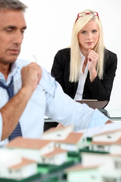 Portrait of an architect's assistant working with her boss — Stock Photo, Image