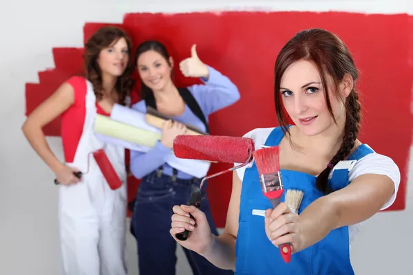 Girls red wall painting — Stock Photo, Image