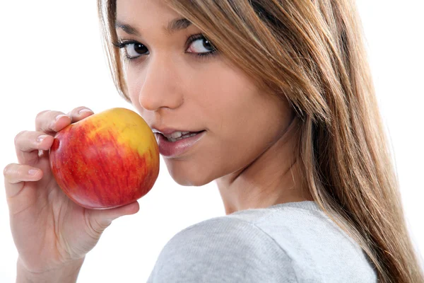 Brunette with apple — Stock Photo, Image