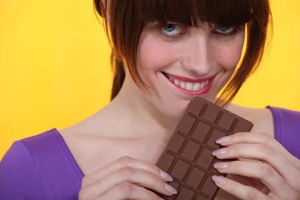 stock image Woman eating chocolate