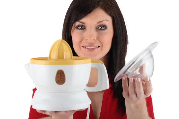 Woman with juicer — Stock Photo, Image