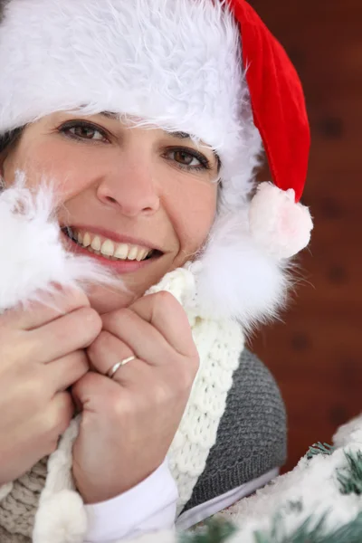Kvinna i en Santa hatt — Stockfoto