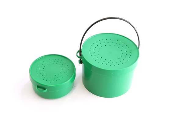 Duas latas verdes com tampas perfuradas — Fotografia de Stock
