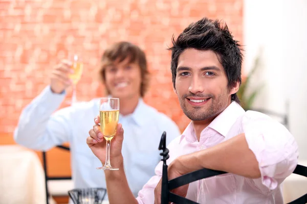 Friends with champagne — Stock Photo, Image