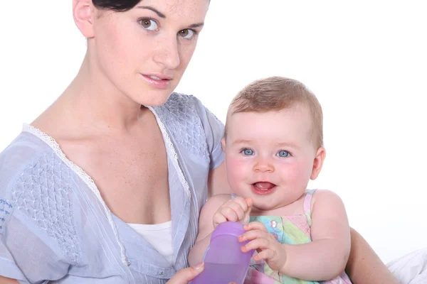 Young woman holding her baby — Stock Photo, Image