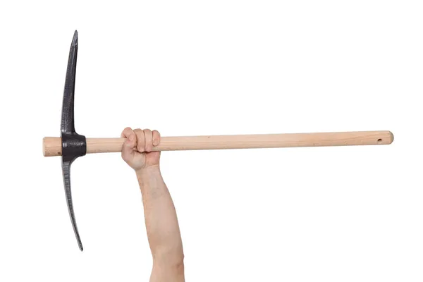 A hand holding a pickaxe — Stock Photo, Image