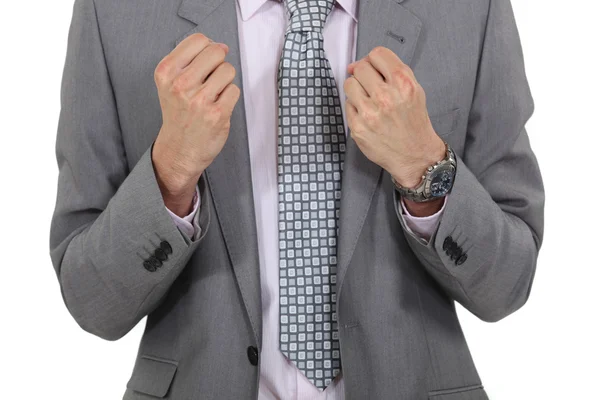 Angry businessman clenching his fists — Stock Photo, Image