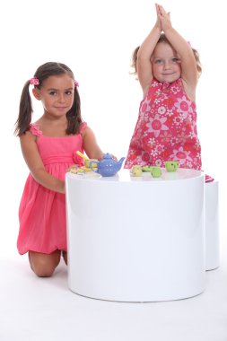 Children having a tea party clipart