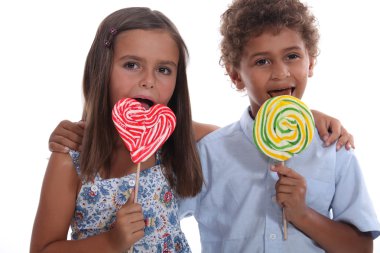 Children with lollipops clipart