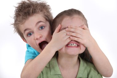 Children playing peek-a-boo clipart