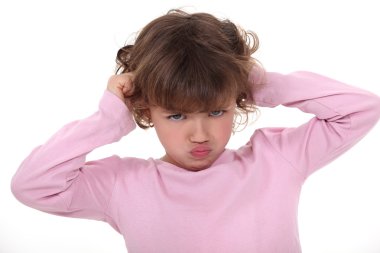 A little angry girl. clipart