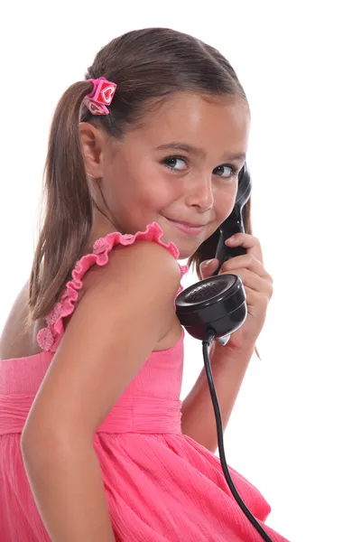 Lány a régi telefon-kézibeszélő — Stock Fotó