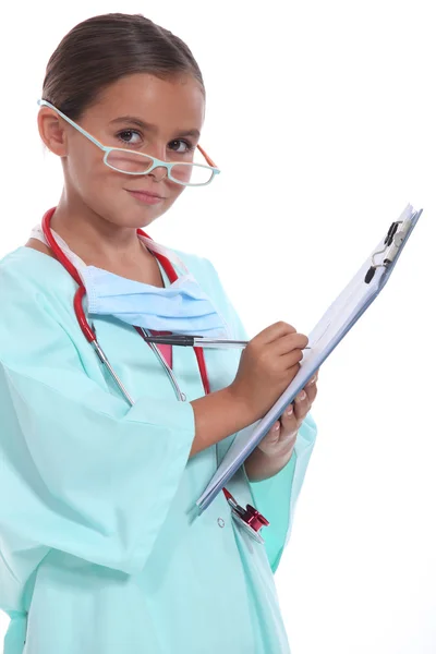 Mädchen als Krankenschwester verkleidet — Stockfoto