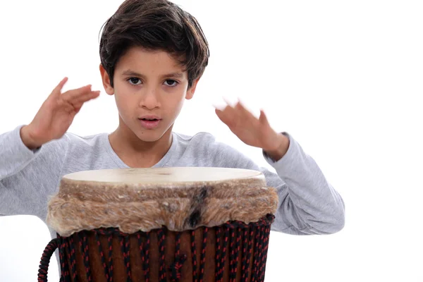 Schoolboy with jumbo drum — Stock Photo, Image