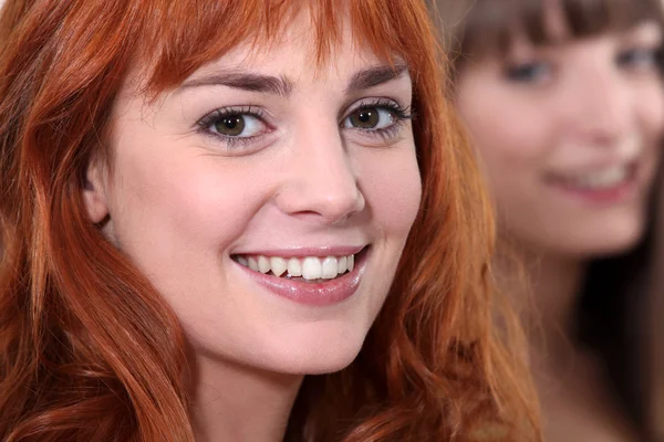 Closeup portrait of young woman all smiles with ginger hair — Stock Photo, Image