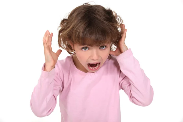 Маленькая девочка кричит — стоковое фото