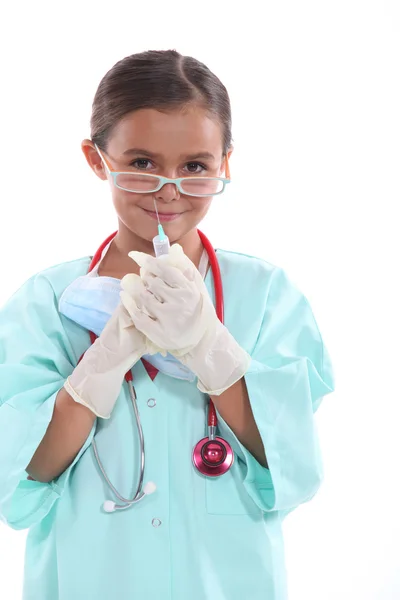 Mädchen als Krankenschwester verkleidet Stockbild