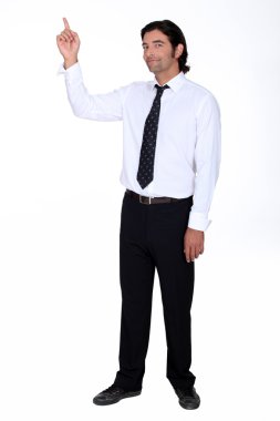 Man in a shirt and tie pointing upwards clipart