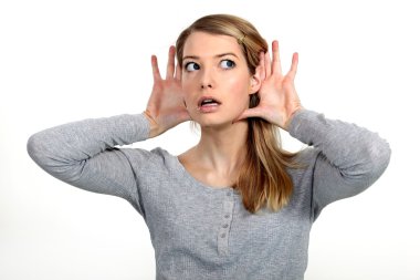 Blond woman struggling to hear clipart