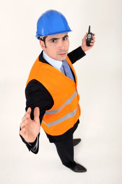 Foreman with a walkie talkie clipart