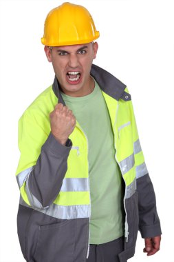 Aggressive construction worker rejoicing clipart