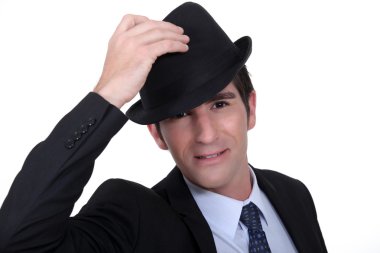 Businessman doffing his hat clipart