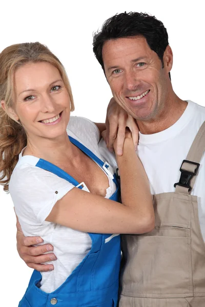 Couple in working clothes — Stock Photo, Image