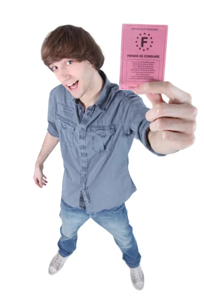 Junge zeigt Führerschein — Stockfoto