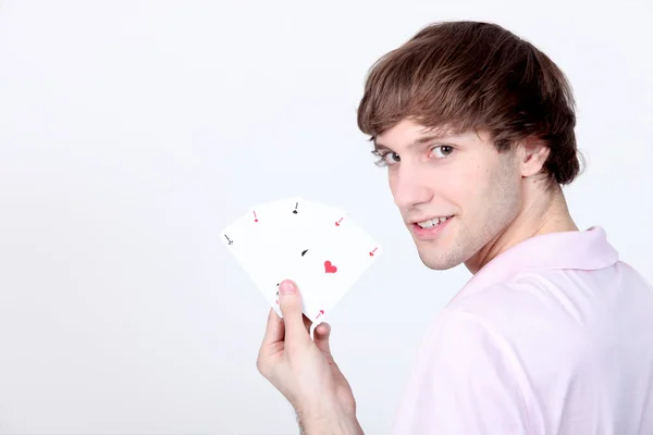 Young man holding four Aces — Stock Photo, Image