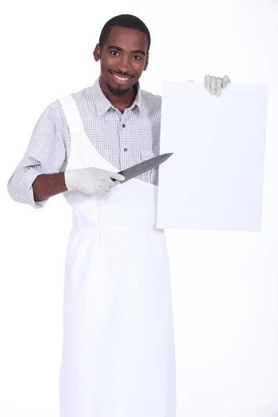 Chef-kok met een witte snijplank en scherp mes — Stockfoto