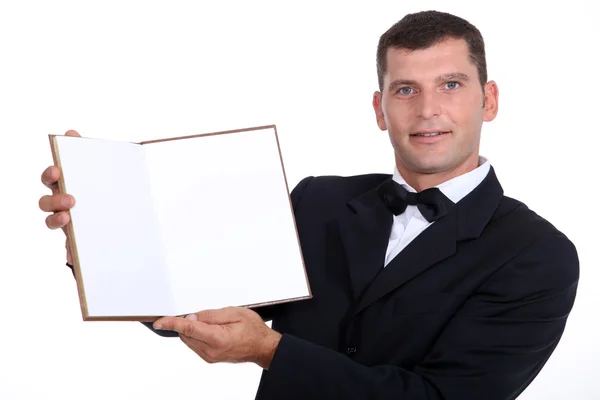 Waiter showing menu — Stock Photo, Image