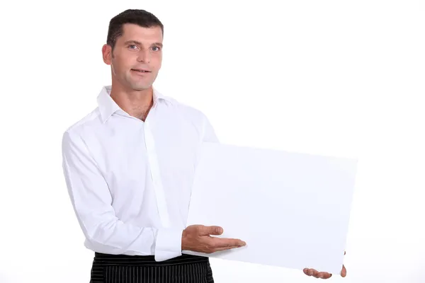 Hombre mostrando panel blanco —  Fotos de Stock