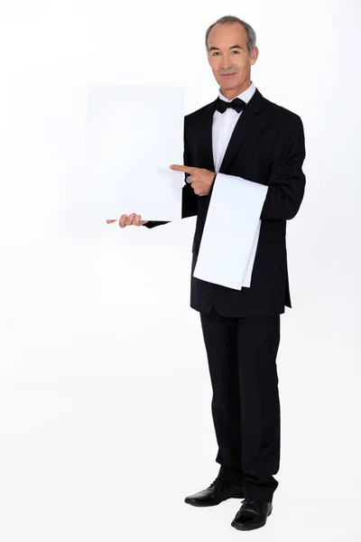 Waiter with a blank menu — Stock Photo, Image