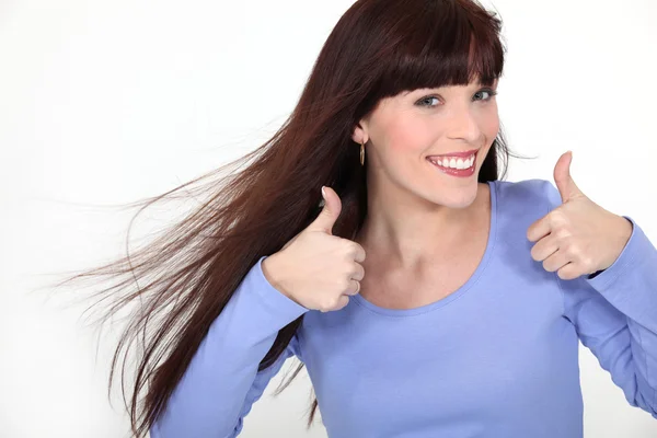 Attractive woman giving two thumbs up — Stock Photo, Image