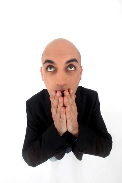 Bald man with expression of surprise on white background — Stock Photo, Image